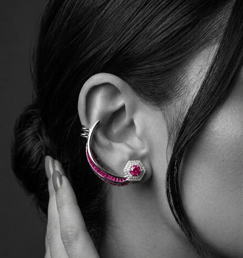 Smooth sculptural silver ear cuff detail with curved silhouette