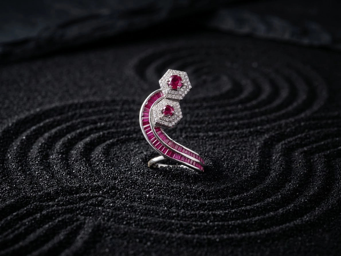 Ruby center detail in sculptural silver bloom ring