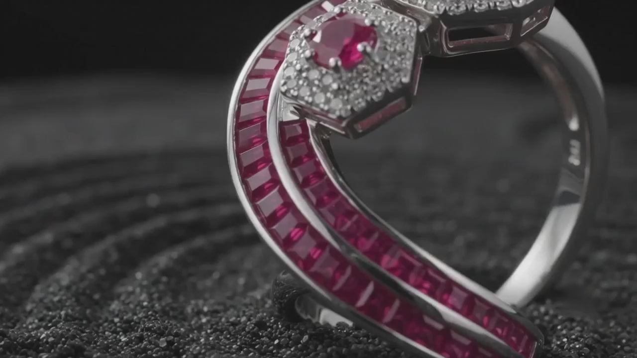 Sculptural silver bloom ring with ruby centerpiece in motion