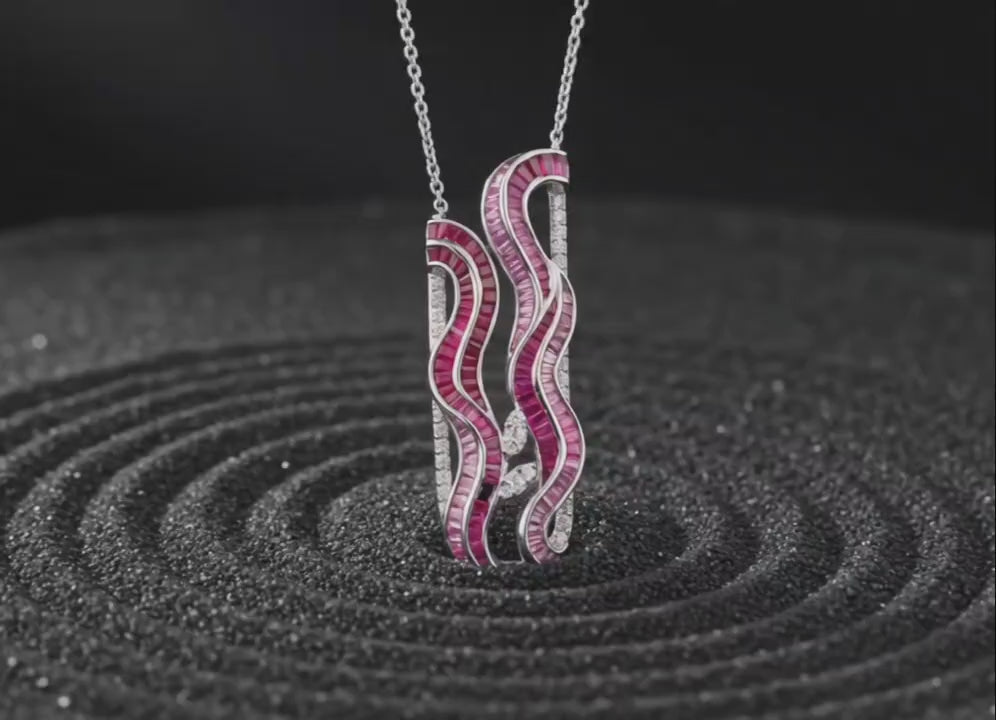 Sculptural U-shaped silver pendant ruby design in motion