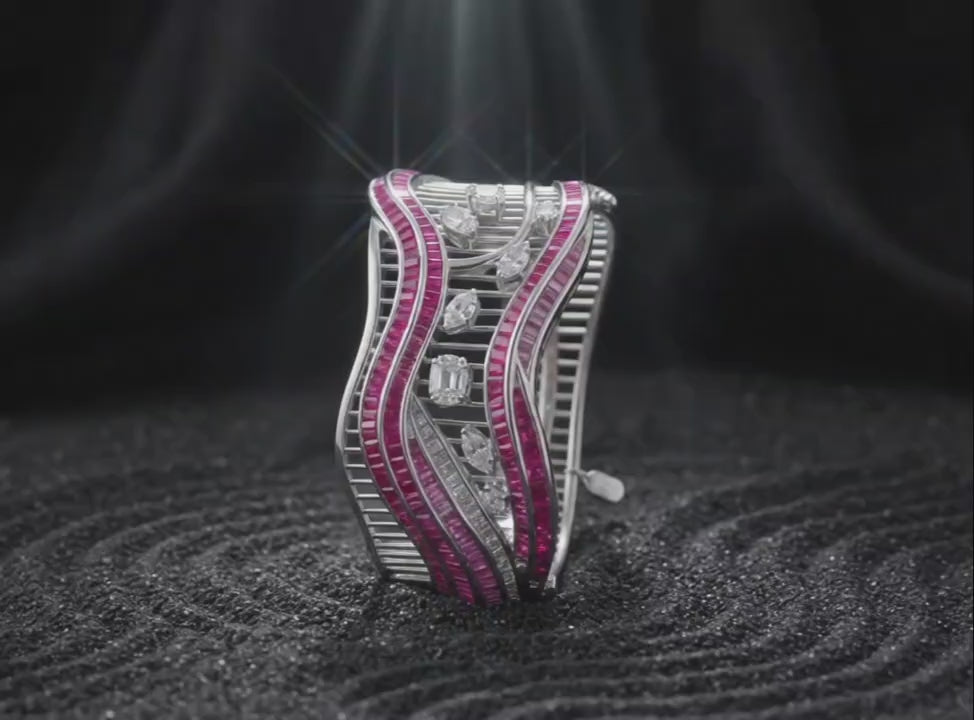 Sculptural silver cuff bracelet wave form design in motion